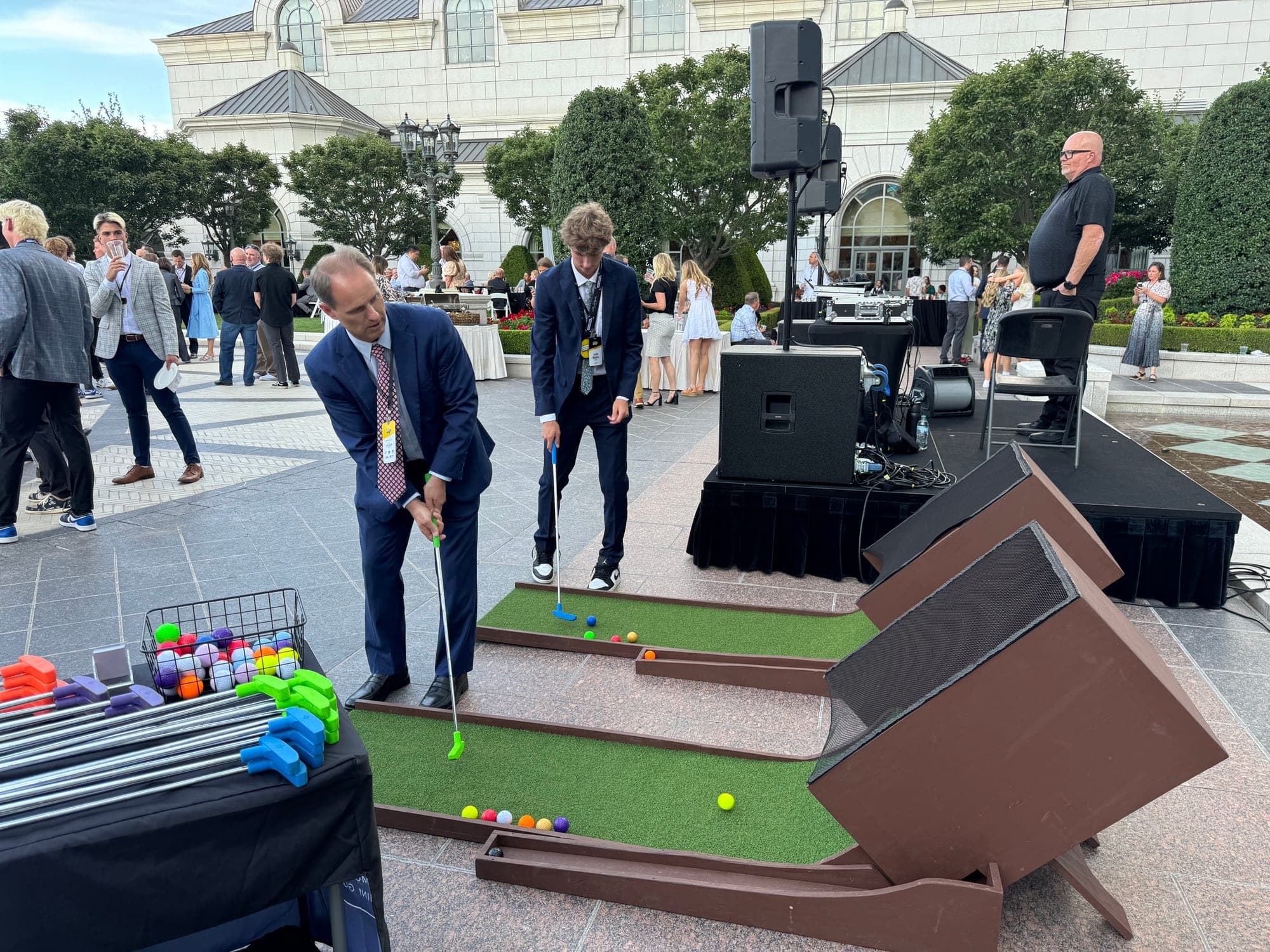 Guests playing Skee-Putt at an event
